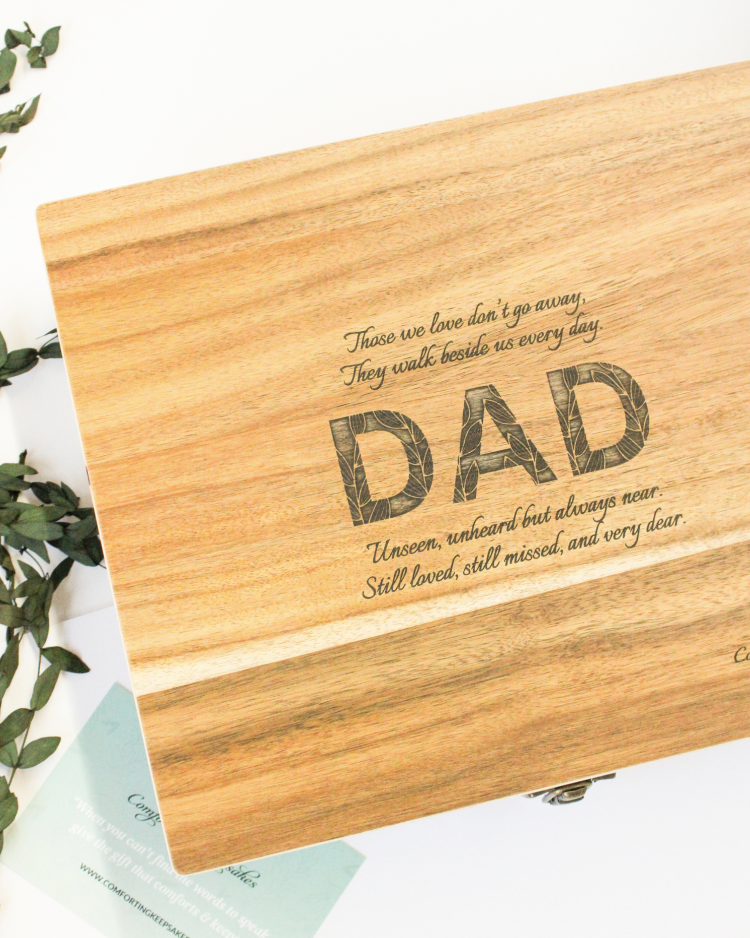 DAD engraved keepsake box on a white background with a plant
