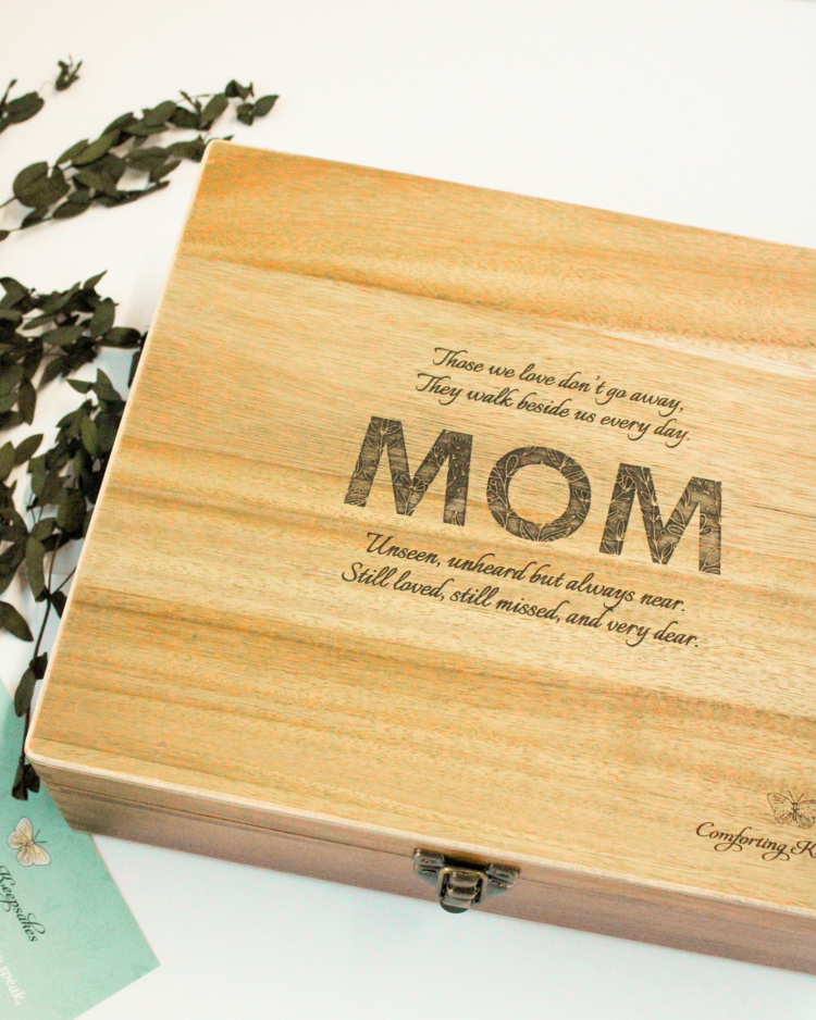 engraved acacia wood box that says MOM and is on a white background