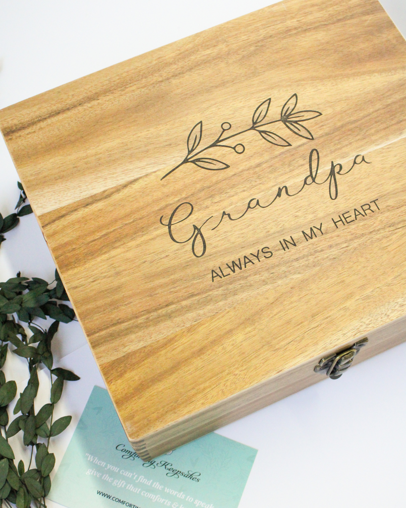 acacia wood box on a white background that has a flower engraved and "grandpa always in my heart"